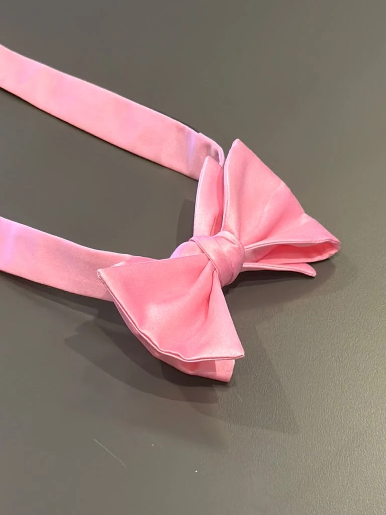 Pink bow tie at Modern Suit & Dress