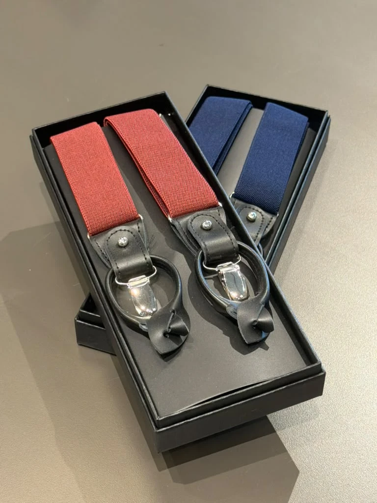 Red and navy suspenders at Modern Suit & Dress