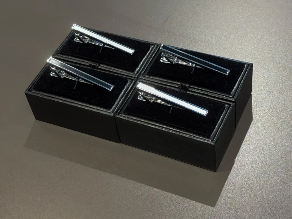 Tie clips in presentation boxes at Modern Suit & Dress