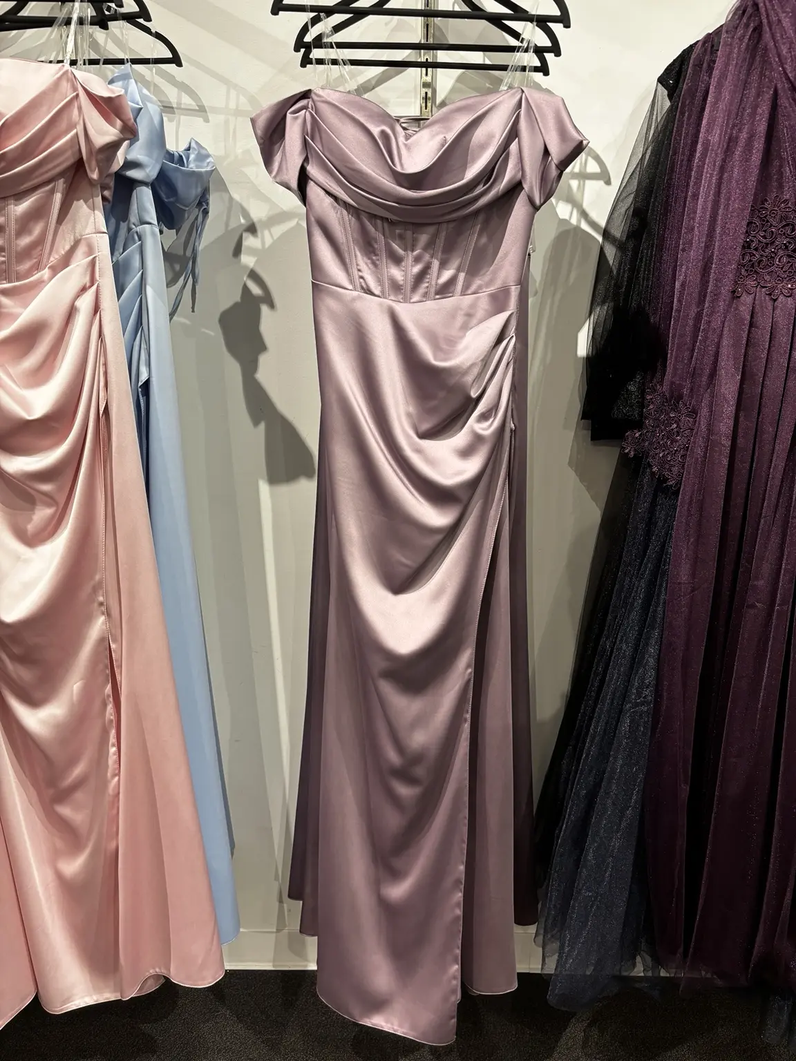 Mauve satin formal dress displayed in the Modern Suit & Dress store